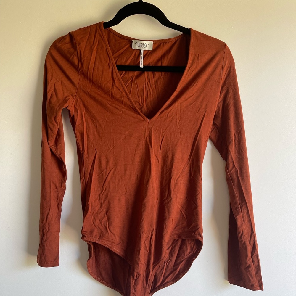 Long sleeve body suit size M